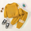 Tzoutfits offers the Baby Boy Yellow Stripe Fleece Tracksuit, crafted from soft fleece for ultimate comfort. With fun yellow stripes